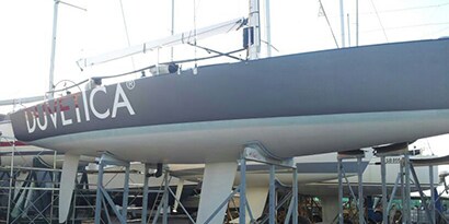 Polyester/fiberglass sailboat hull bonded together with industrial adhesive
