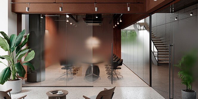 Sala de reunião com paredes de vidro translucidos.
