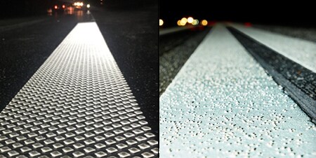 Close up shot of road markings and pavement.
