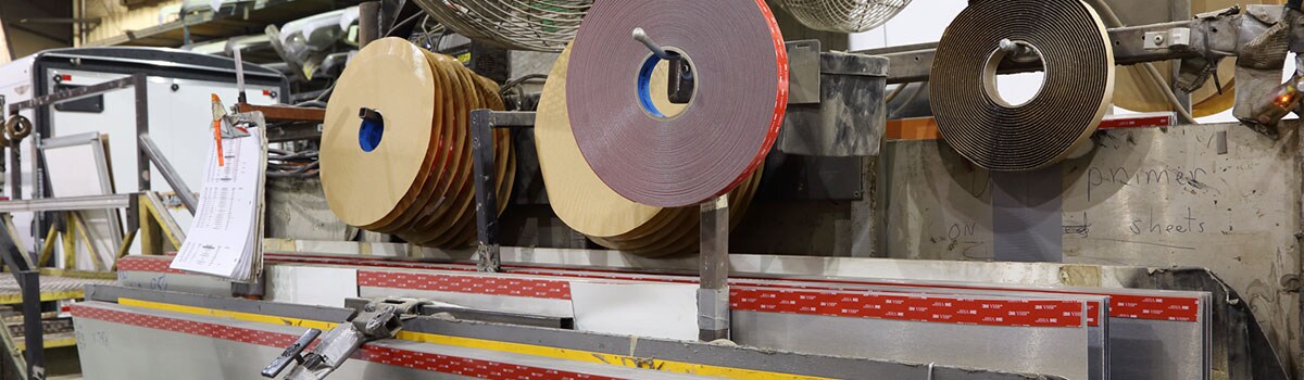 Image of 3M™ VHB™ Tape ready for use in an assembly plant
