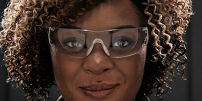 woman wearing safety glasses
