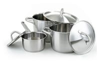 Three stainless steel pots and lids.