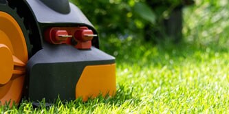 A robotic lawn mower in operation
