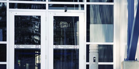Glass front doors and windows on a building
