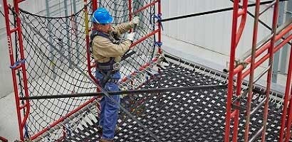 Fall protection trainer in fall protection training facility
