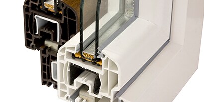 Vinyl or rigid PVC cross section showing window frame and glass bonded together with 3M adhesive
