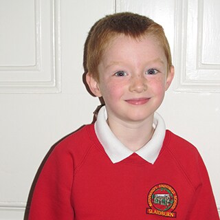 Andrew, a student at Brennand’s Endowed Primary School