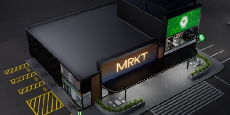 Fachada moderna de uma loja com a marca MRKT, representando as soluções gráficas da 3M.

