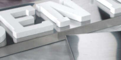 Acrylic letters in a sign to be bonded with plastic adhesive
