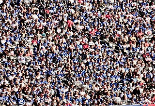 Stock image showing a large crowd of people