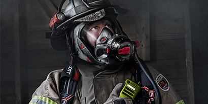 firefighter listening to his radio communciations
