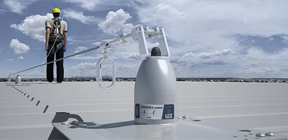 3M permanent horizontal lifeline in use on a roof top
