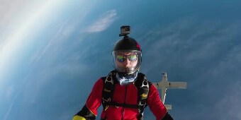 Skydiver midday with a GoPro camera

