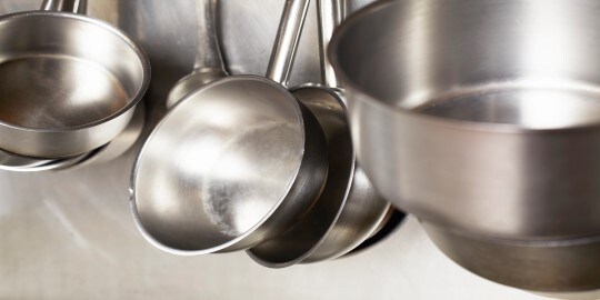 Close up of stainless steel pans
